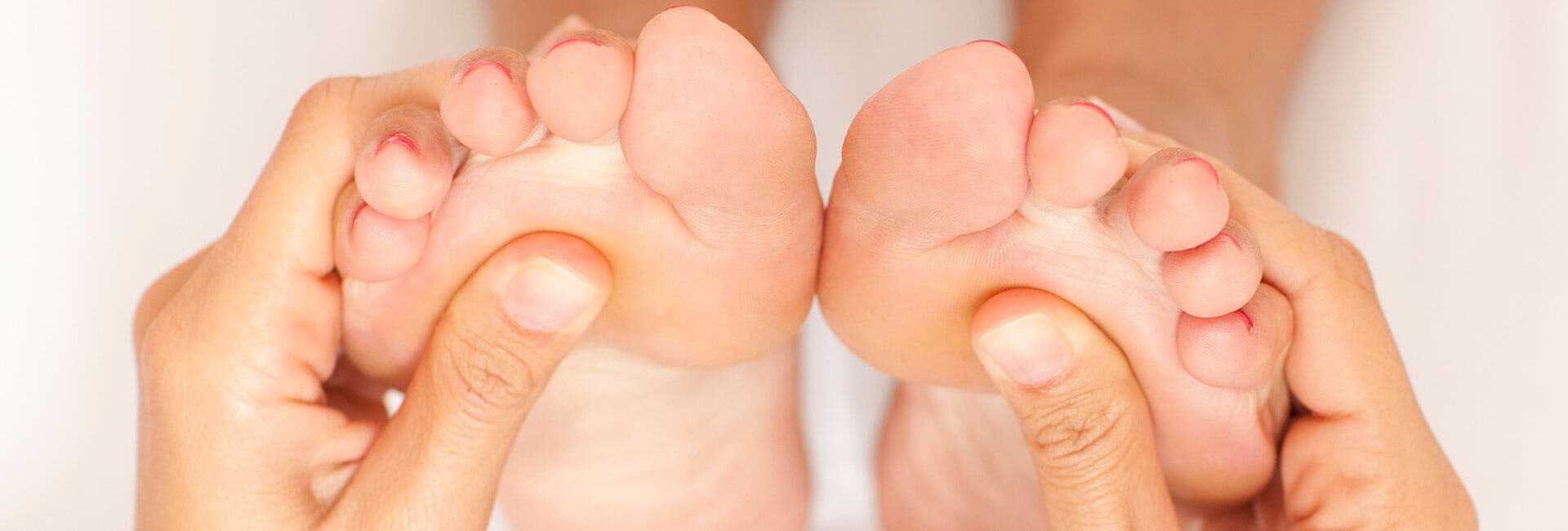 REAL PHOTO: reflexology treatment on both feet