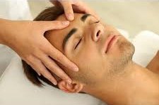 REAL PHOTO: Indian head massage performed with the client seated